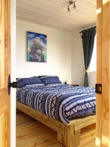 Postel nebo postele na pokoji v ubytování Pichilemuhostel SurfersView