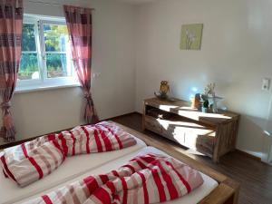 Posteľ alebo postele v izbe v ubytovaní Ferienwohnung Bernhardiner