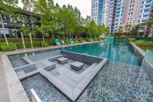 a swimming pool in the middle of a building at Emerald Hill Kuala Lumpur by HLG in Kuala Lumpur