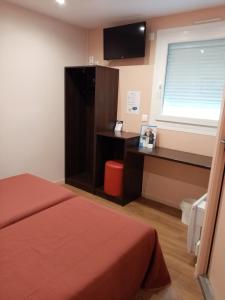 Postel nebo postele na pokoji v ubytování Brit Hotel St-Quentin/Nord