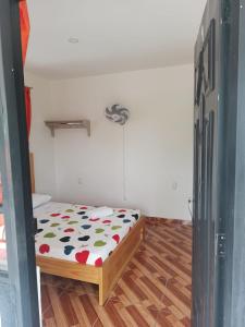 Postel nebo postele na pokoji v ubytování HotelSueños de Acapulco-Eje cafetero-Quindio