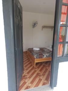 Postel nebo postele na pokoji v ubytování HotelSueños de Acapulco-Eje cafetero-Quindio