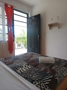 Postel nebo postele na pokoji v ubytování HotelSueños de Acapulco-Eje cafetero-Quindio