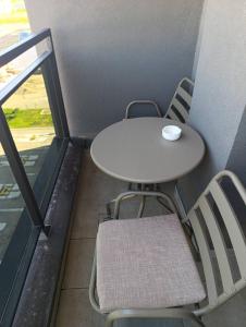En balkon eller terrasse på Apartman Dunja + 1 billede