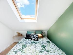 Postel nebo postele na pokoji v ubytování Somptueux appartement duplex proche RER