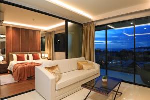 Postel nebo postele na pokoji v ubytování 3 bdr SeaView Apartment walking to Surin Beach by CapitalPro + 32 fotografií
