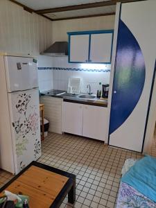 Eldhús eða eldhúskrókur á Gite poisson