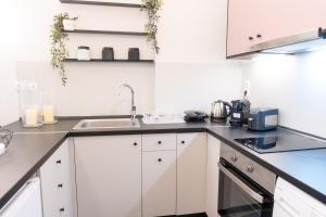 A kitchen or kitchenette at Syntagma Sweet House 2