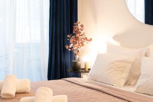 A bed or beds in a room at Syntagma Sweet House 2