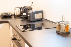 A kitchen or kitchenette at Syntagma Sweet House 2