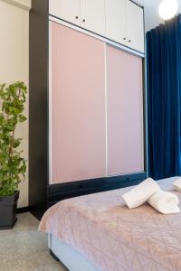 A bed or beds in a room at Syntagma Sweet House 2