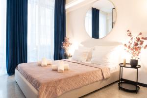 A bed or beds in a room at Syntagma Sweet House 2