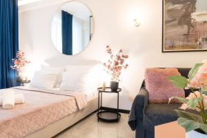 A bed or beds in a room at Syntagma Sweet House 2