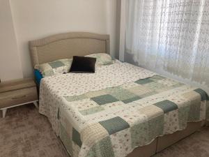 Ένα ή περισσότερα κρεβάτια σε δωμάτιο στο Europa Family Flat