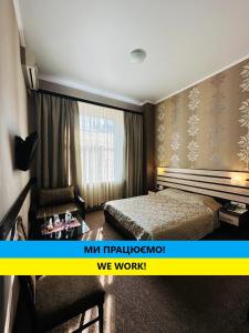 Posteľ alebo postele v izbe v ubytovaní Classic Hotel