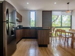 Nhà bếp/bếp nhỏ tại Amira Residence Confortable 1 BR in Aldea Zama +7 ảnh