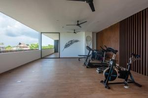 Phòng/tiện nghi tập thể dục tại Amira Residence Confortable 1 BR in Aldea Zama