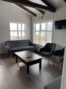 Un lugar para sentarse en Úthlíd Cottages