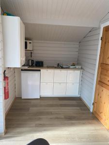 Una cocina o kitchenette en Úthlíd Cottages