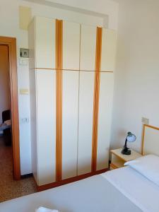 Postel nebo postele na pokoji v ubytování Hotel Serafini Misano Adriatico