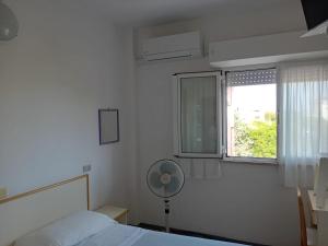 Postel nebo postele na pokoji v ubytování Hotel Serafini Misano Adriatico