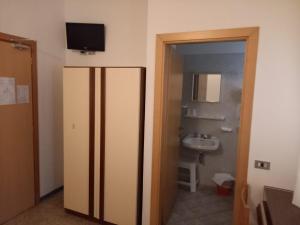Koupelna v ubytování Hotel Serafini Misano Adriatico