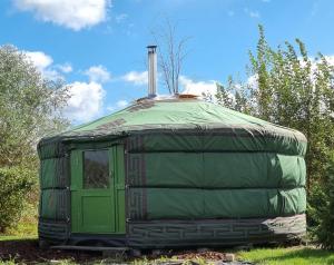 a green dome with a pole on top of it at Yurt 2-4p in Ravels