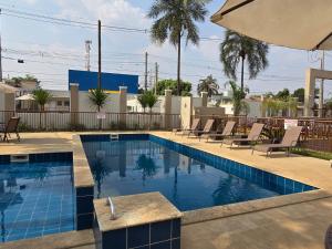 Πισίνα στο ή κοντά στο Apartamento com ar condicionado