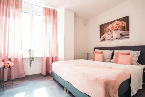 Ένα ή περισσότερα κρεβάτια σε δωμάτιο στο Hotel am Schafbaum