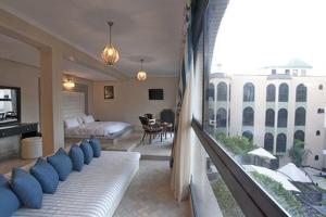 Postel nebo postele na pokoji v ubytování Palais Ommeyad Suites & Spa