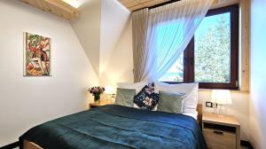 Posteľ alebo postele v izbe v ubytovaní VIP Apartamenty VILLA GORSKI SEN