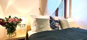 Posteľ alebo postele v izbe v ubytovaní VIP Apartamenty VILLA GORSKI SEN