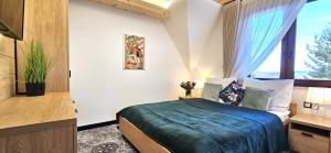 Posteľ alebo postele v izbe v ubytovaní VIP Apartamenty VILLA GORSKI SEN