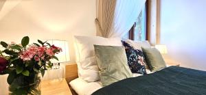 Posteľ alebo postele v izbe v ubytovaní VIP Apartamenty VILLA GORSKI SEN