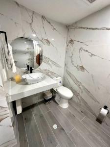 Koupelna v ubytování Exclusivos Apartamentos con playa privada