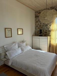 Ένα ή περισσότερα κρεβάτια σε δωμάτιο στο Villa Lilly