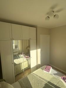 En eller flere senge i et værelse på Plac Słowiański 10