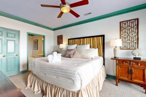 Ένα ή περισσότερα κρεβάτια σε δωμάτιο στο Pavilion Watch #2E +16 φωτογραφίες