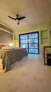 Letto o letti in una camera di Full 2 story Jade House Altre 28 foto