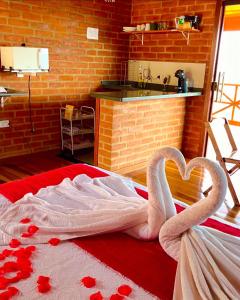 Foto dalla galleria di Chalé 2 hidromassagem lareira e cozinha a Gonçalves