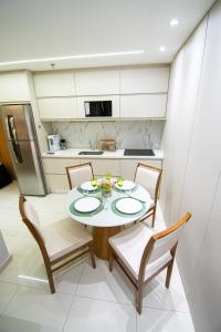 Η κουζίνα ή μικρή κουζίνα στο Apartamento maravilhoso 2