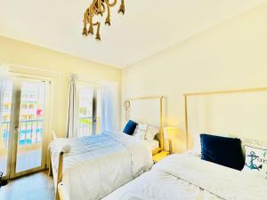 Postel nebo postele na pokoji v ubytování Gouna Luxuy Condo Hotel + 2 fotografie