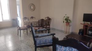 a living room with a dining room table and chairs at Casa Felisa in San Salvador de Jujuy