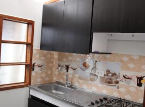 Kuchyň nebo kuchyňský kout v ubytování Donde María Yarce Casa Turística
