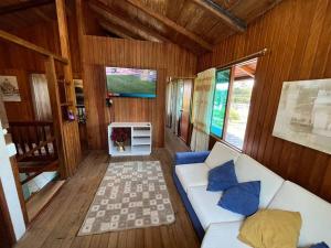 TV a/nebo společenská místnost v ubytování Casa de Emmita