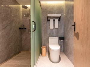 Kép Echarm Hotel Guangzhou Baiyun Airport Huadu Plaza Branch szállásáról Huatuban a galériában