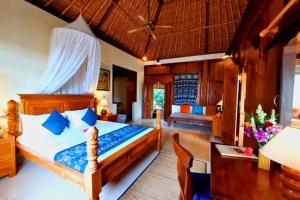 Postel nebo postele na pokoji v ubytování Punita 1 BR Grand Deluxe Garden ZN237