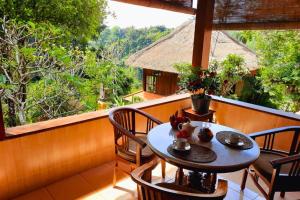 Balkón nebo terasa v ubytování Punita 1 BR Grand Deluxe Garden ZN237