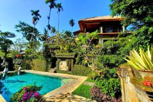 Bazén v ubytování Punita 1 BR Grand Deluxe Garden ZN237 nebo v jeho okolí