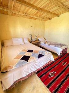 Postel nebo postele na pokoji v ubytování قريه الطلائع